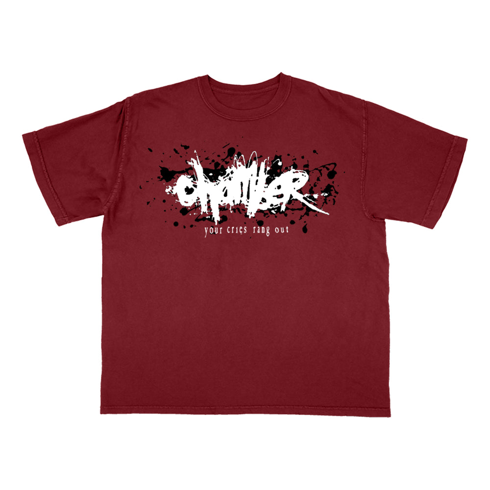 A Chamber Comfort Colors maroon shirt features a black paint splatter design with bold white graffiti-style "OMEN" text and smaller text below that reads "your cries ring out.