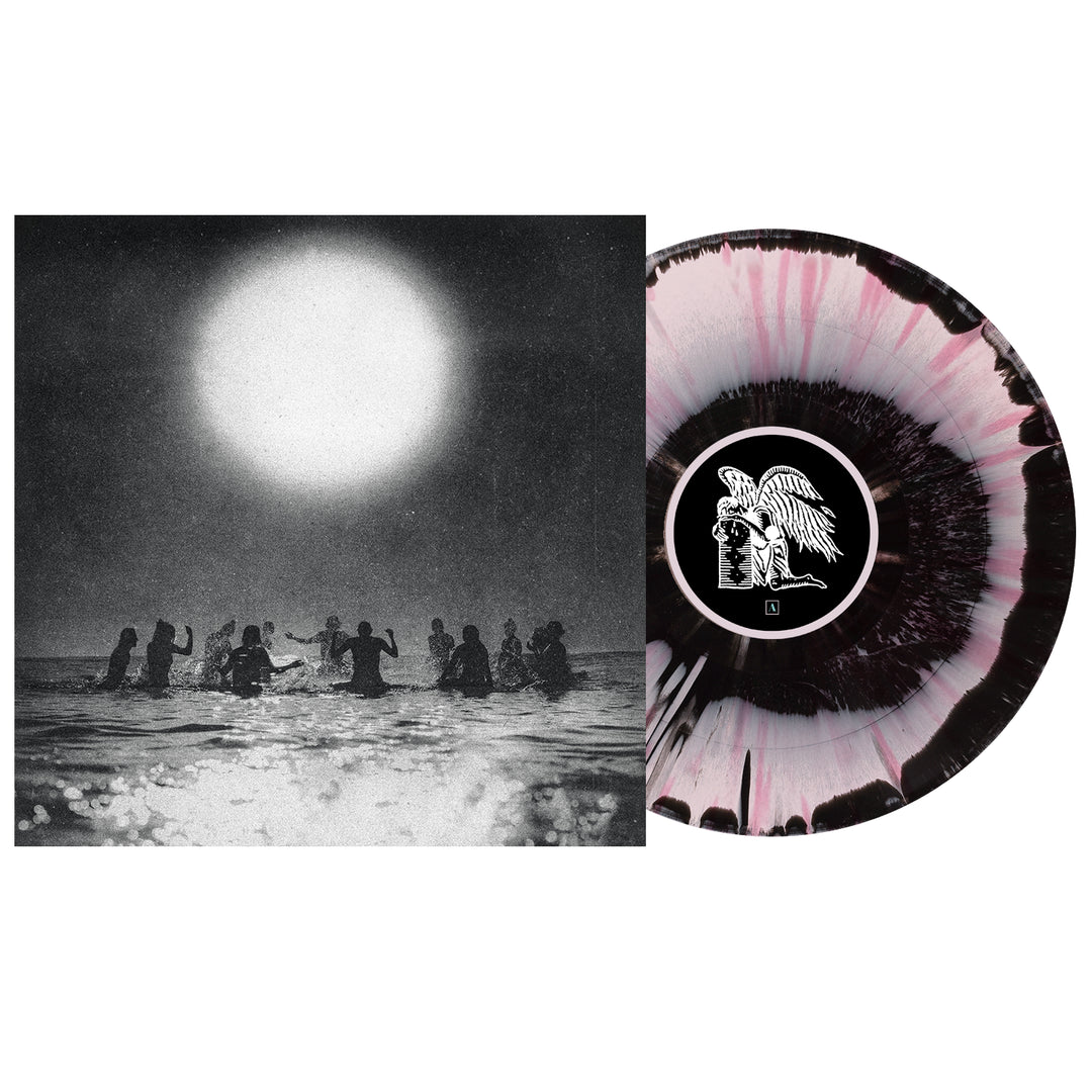 A black-and-white Seahaven album cover shows people in water under a large sun. Beside it is a 2026 Seahaven release: a black and white splatter vinyl with a winged angel on the center label.
