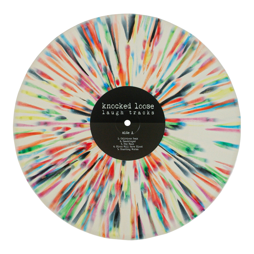 A limited edition Knocked Loose 17th Press vinyl with a white base and Bone w Rainbow Splatter design. Center label reads "knocked loose laugh tracks" with song titles beneath.