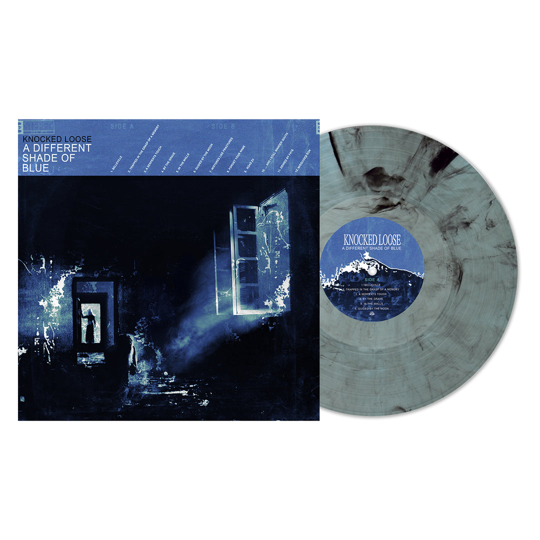 A marbled gray and black vinyl from Knocked Loose’s 13th press of "A Different Shade of Blue," shown next to its album cover featuring a dark, blue-toned doorway lit by electric, smoke-like light.
