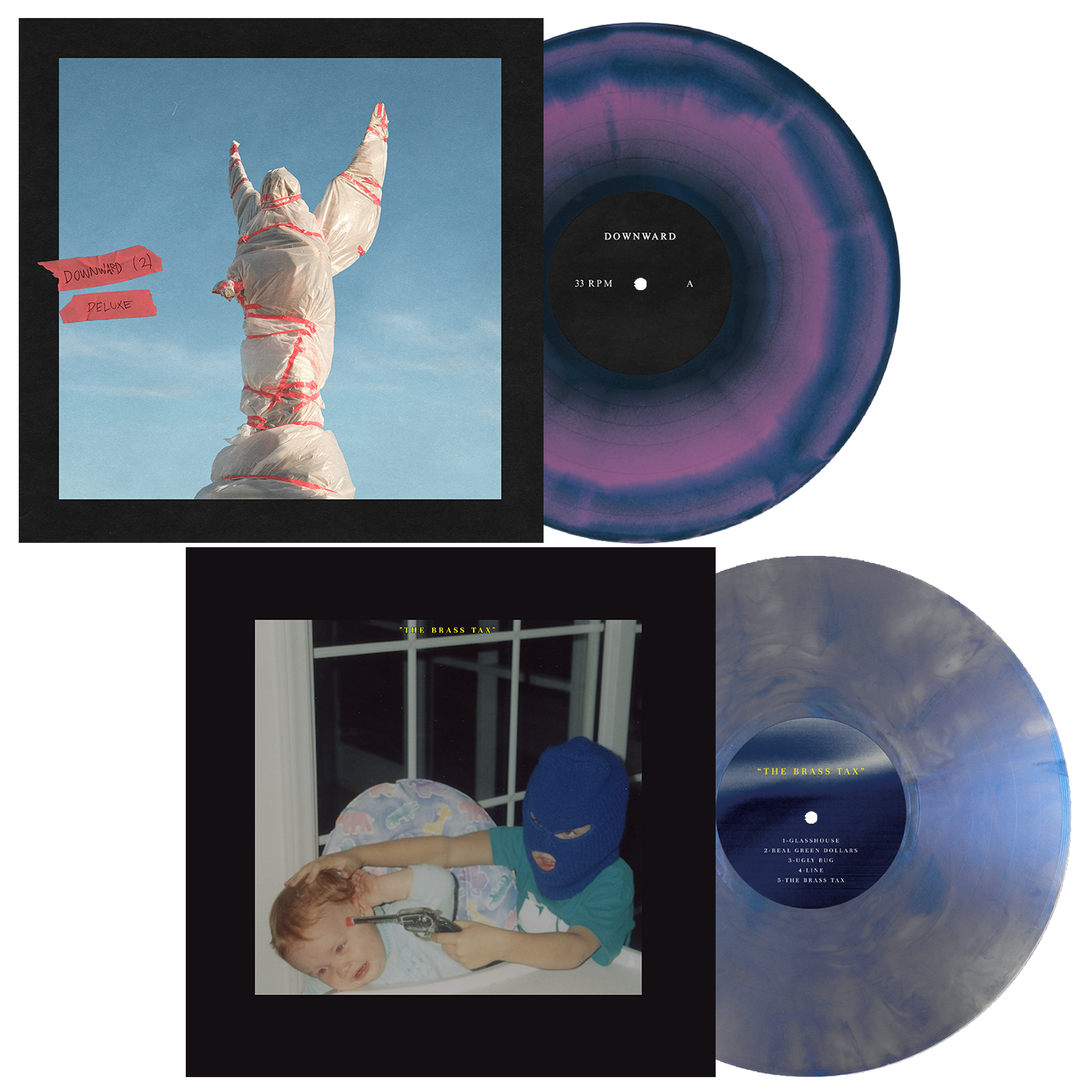 DOWNWARD offers two vinyl albums: a Deluxe Purple/Aqua Blue Marbled LP with a wrapped statue-like figure on the cover, and a Silver Marbled LP featuring two children—one in a balaclava—on the cover.