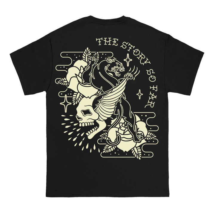 The Story So Far black Comfort Colors t-shirt features an illustrated panther, winged skull, roses, and stars, with THE STORY SO FAR arching above the artwork in bold retro-style lettering.