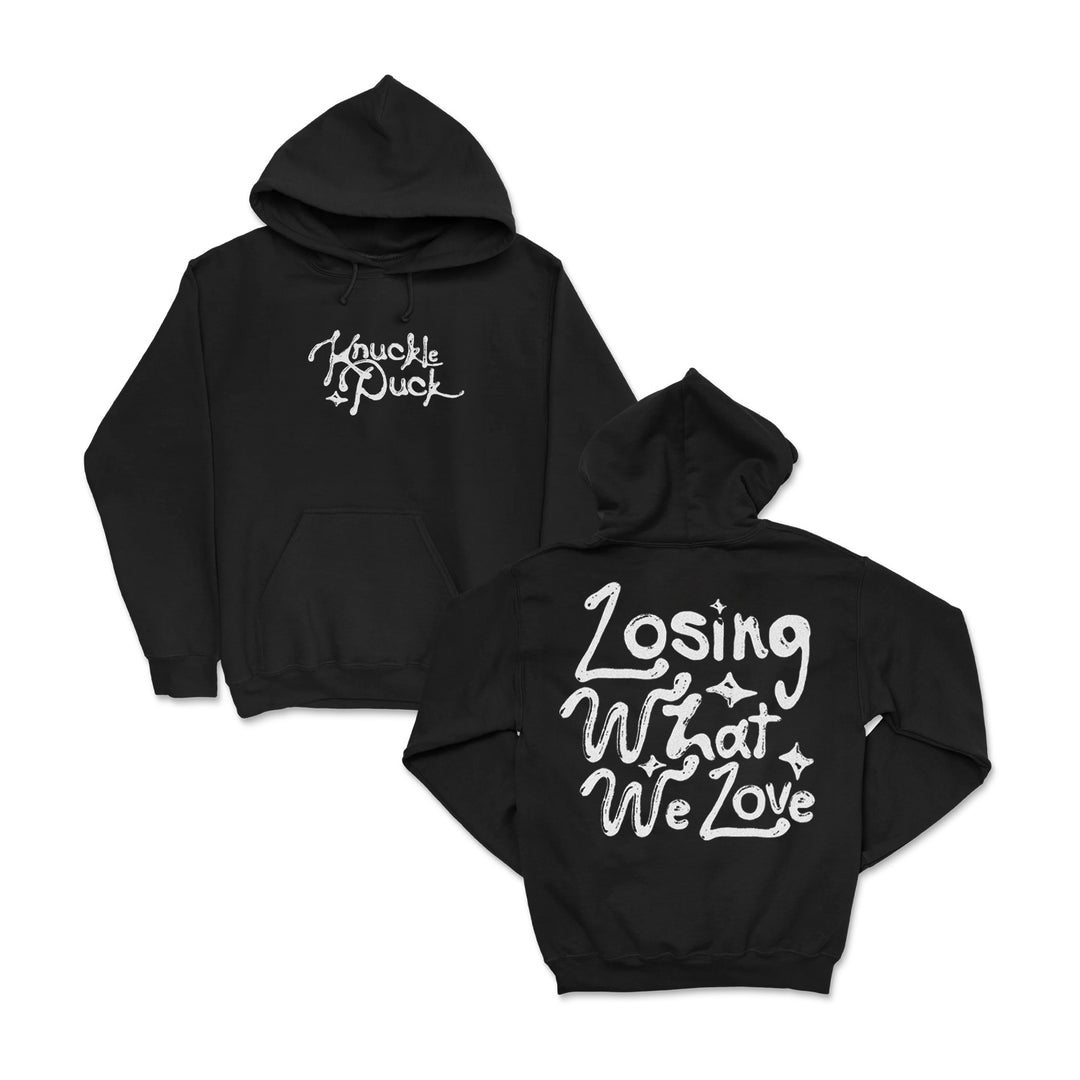 Black XXX-Large Knuckle Puck hoodie shown front and back. Front displays Knuckle Puck in white script; back has large white "Losing What We Love" text with decorative stars and swirls.