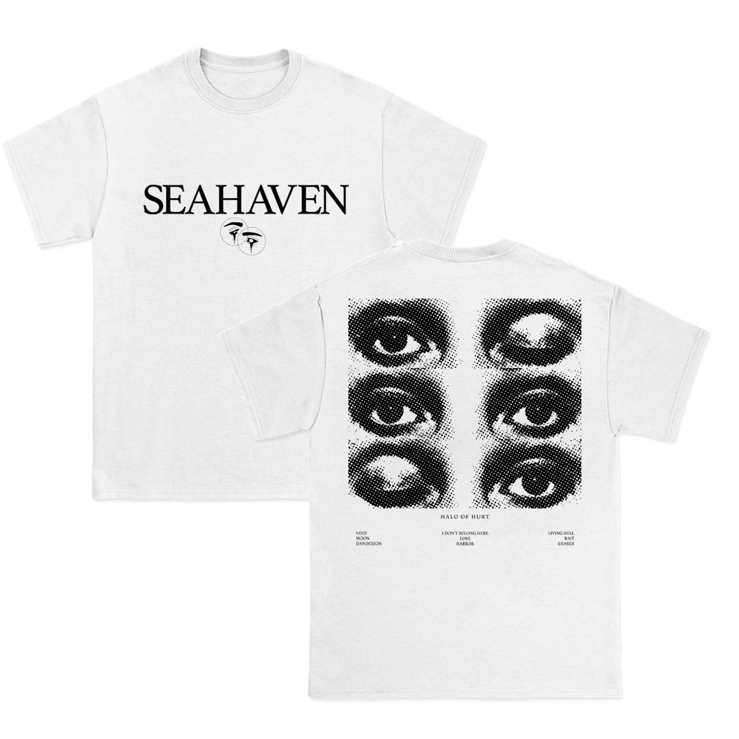 Seahaven white t-shirt with SEAHAVEN text and small front symbols; back features six black-and-white halftone eyes and subtle text detailing below.