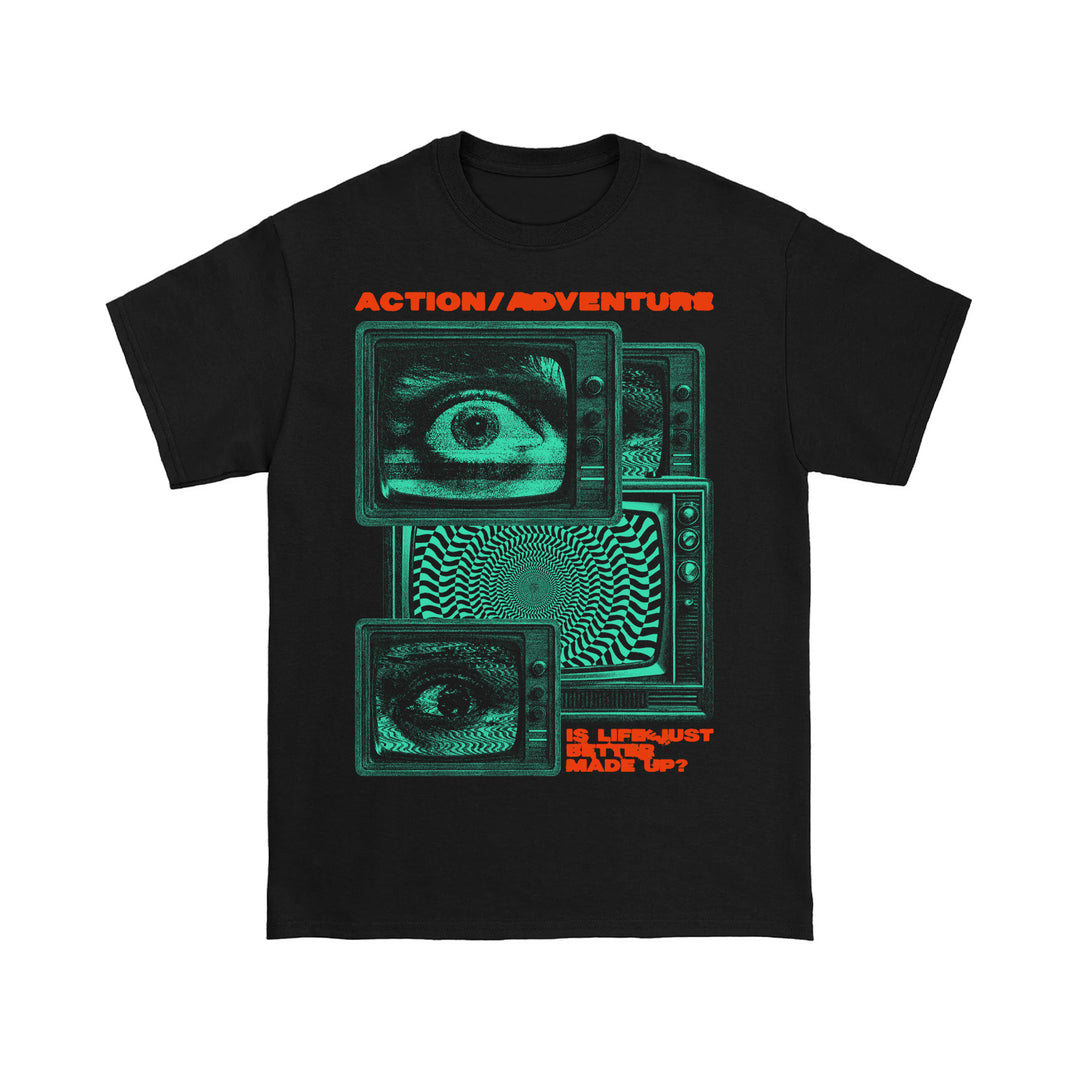 Action/Adventure black tee with green glitch TV screens featuring eyes, hypnotic spiral, and static. ACTION/ADVENTURE at top; IS LIFE JUST MADE UP? in orange at bottom.