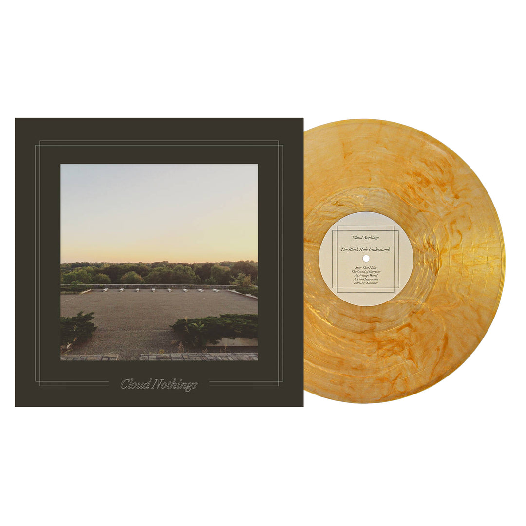 A marbled yellow vinyl record and its square album cover—a rooftop at sunset, distant trees, and Cloud Nothings at the bottom—ideal for fans of Cloud Nothings seeking The Black Hole Understands on vinyl.