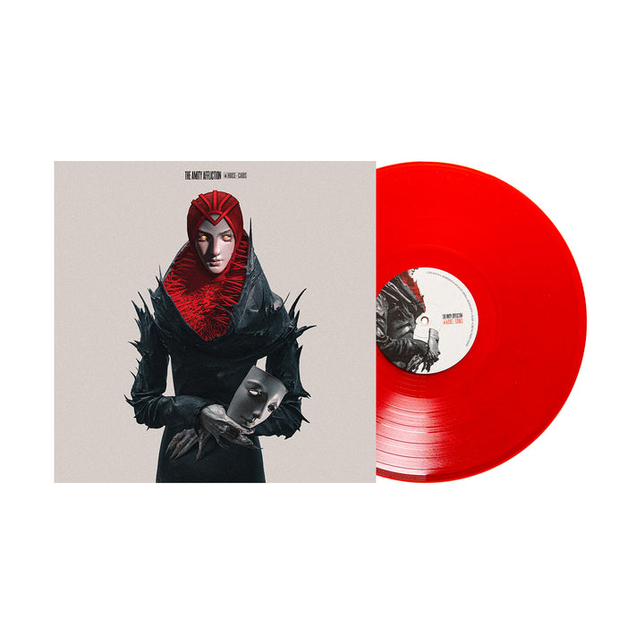 A cloudy blood red House Of Cards vinyl sits by its cover, featuring The Amity Affliction's figure in black with spiked sleeves and a red headpiece, holding a mask-like face on a light gray background. An Amity Exclusive release.