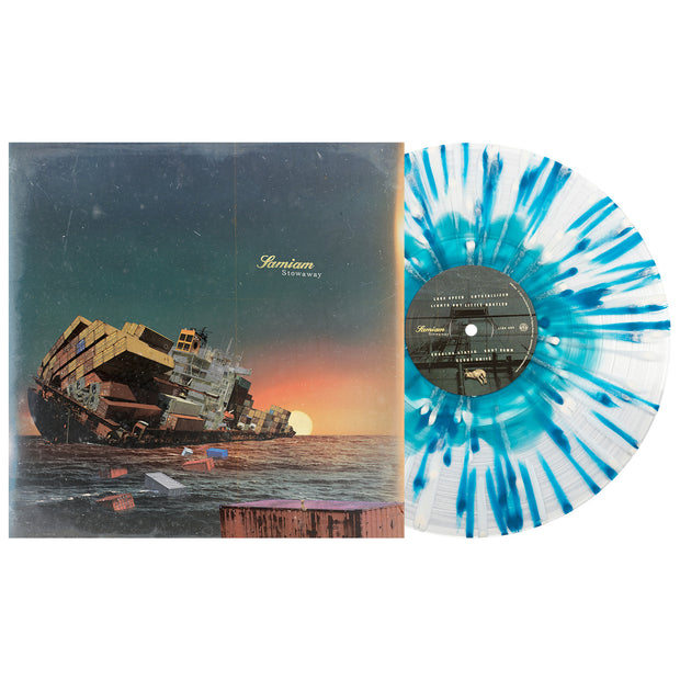 Samiam Stowaway Vinyl LP. Album Art depicts a large boat with shipping containers sinking at sunset. Vinyl color is Blue in clear with blue and bone splatter.