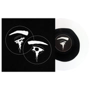 image of a Black in Milky Clear vinyl record on the right, album cover on the left on a white background. cover is all black with two white circles overlapped with white markings inside. 