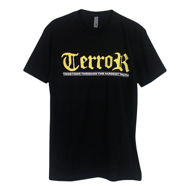 image of the front of a black tee shirt on a white background. tee has a print across the chest. in yello says TERROR and in white below says together through the hardest truth