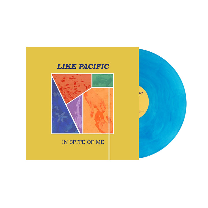 A yellow vinyl album cover for Like Pacific's "In Spite of Me" displays colorful abstract shapes, with a bright blue record peeking out and the track "Sedatives" highlighted on the back. Brand Name: Like Pacific.