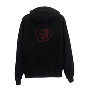 image of the back of a pullover hoodie on a white background. the back of the hoodie has a small print in the center in red ink that has two circles, and a skull in the center.