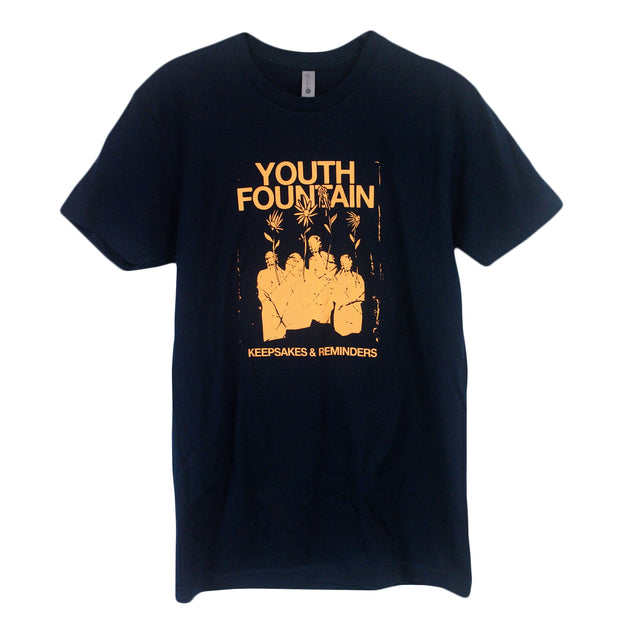 image of a navy tee shirt on a white background. front and center chest print in yellow that says youth fountain at the top, with four people blocked out holding large flowers above them and says keepsakes & reminders at the bottom