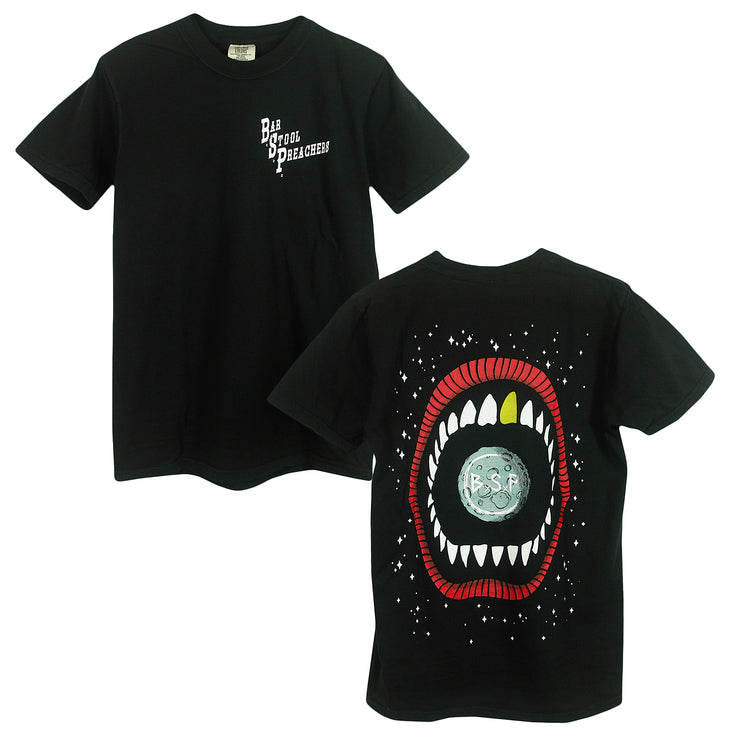 black tee with "Bar Stool Preachers" printed in white on the front left chest. Large mouth with 1 gold tooth and a moon in the center printed on the back with a stary galaxy. 