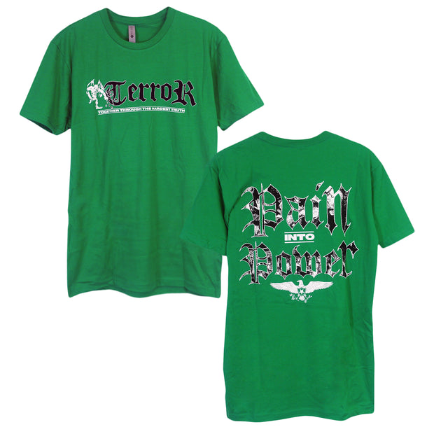 image of the front and back of a green tee shirt on a white background. front of the tee is on the left and has a center chest print in black that says terror. on the left in white is a demon and below says together through the hardest truth. the back of the tee is on the right and has a back print in black and white that says pain into power with an eagle at the bottom