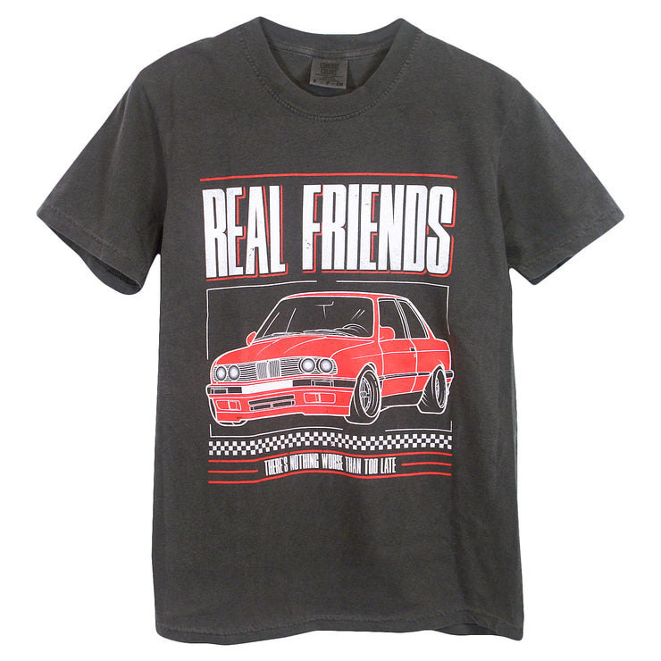 Real Friends Grey Racer Tee shirt. Real Friends text printed in white with red shadow at the top. Red car printed in the center. There's Nothing Worse Than Too Late text in white under the car. 