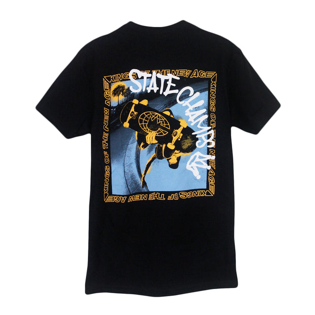 image of the back of a black tee on a white background. the back of the tee  has a full back print of a yellow and black guy on a skateboard in an empty pool in blue with a yellow sqaure border around it that says kings of the new age
