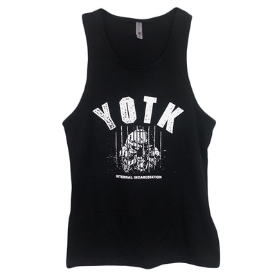 image of a black tank top on a white background. tank has center chest print in white that says Y O T K with a demon face behind bars and interal incarceration across the bottom