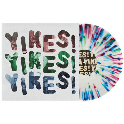 Dollar Signs YIKES vinyl LP, with the vinyl exposed to show color. Album art is the text YIKES! repeated 3 times in red, green, then blue with a white background. color of vinyl is White in Clear with red, green and blue splatter.
